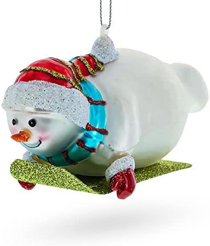 Snowman Glass Christmas Ornament - Gleefully Riding a Sled