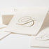 Caspari Pack of 24 White Pearl Paper Linen Guest Towels, Monogram Initial Abstract