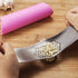 Fu Store Garlic Press - 304 Stainless Steel Garlic Rocker Mincer with Silicone Peeler (Color Random)