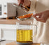 TLIOCAS Large Glass Bacon Grease Container with Strainer - 53 OZ Frying Oil