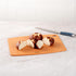 Restaurantware Nature Tek Double-Sided Cutting Board, 14.5 x 10.8 Inch, Durable Kraft Wood Fiber Dishwashable Board