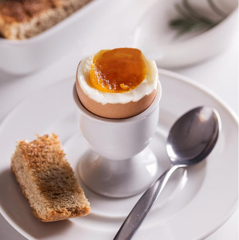 vibedor 4 Pcs Ceramic Egg Stand Holders, Porcelain Egg Holders White Egg Cups for Soft Boiled Eggs in Kitchen