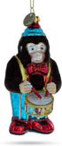Fluffy Monkey Drumming Blown Glass Christmas Ornament