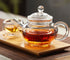 123Arts Small Tea Pot, Glass Teapot with Infuser, 8 Oz Kettle for Loose Tea with Lid