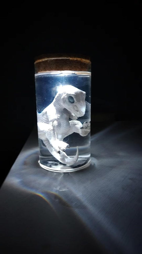 TONGQIC Unique Dinosaur in Glass Bottle Figurine - A Touch of Jurassic Charm
