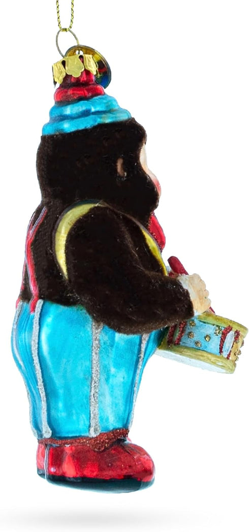 Fluffy Monkey Drumming Blown Glass Christmas Ornament