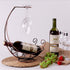 Homya Tabletop Metal Wine Bottle Rack, Elevated Vertical Countertop Organizer for 1 Bottle and 2 Glasses