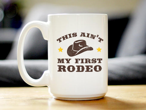 Ain't My First Rodeo Coffee Mug - Funny Cowboy or Cowgirl Gifts for Men & Women - Fun Unique Party Decor Cup - Large 15oz White Ceramic Mug