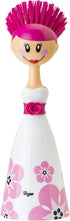 Vigar Dolls April Dish Brush - Ergonomic Handle with Dress-shaped Storage Holder, White & Pink - Scrub Brush for Kitchen