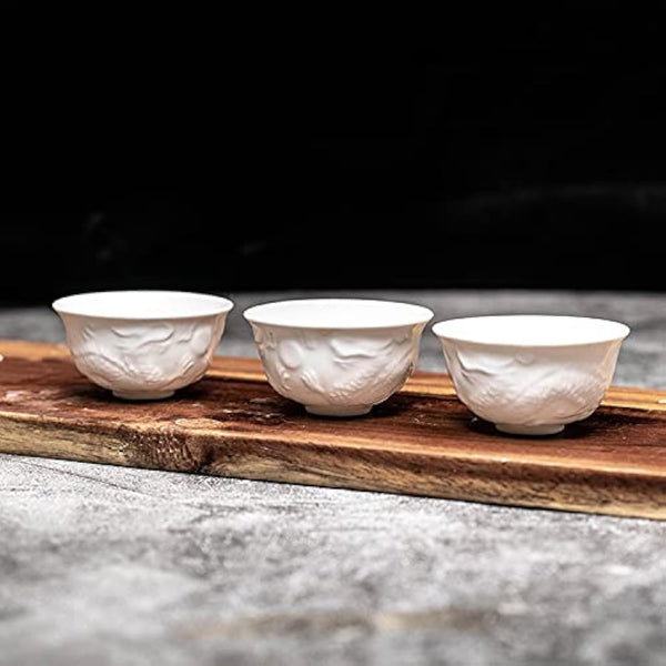 Handmake Ceramic Mini Kungfu Tea Cups Set of 6, White Porcelain Tiny Teacups with Chinese Embossed Dragon Style