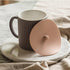Carrotez 2 Pack Silicone Cup Cover Lids, 4.3 Inch Reusable Mug Covers for Coffee and Tea, Pink Beige