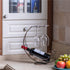 Homya Tabletop Metal Wine Bottle Rack, Elevated Vertical Countertop Organizer for 1 Bottle and 2 Glasses
