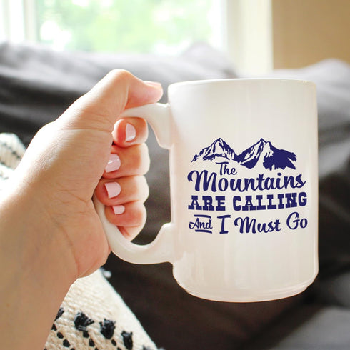 The Mountains Are Calling And I Must Go - Coffee Mug - Fun Mountain Themed Gifts - Large 15oz White Ceramic