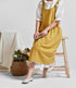 NEWGEM Cotton Linen Cross Back Apron for Women with Pockets for Cooking Cleaning Yellow without Waist Ties