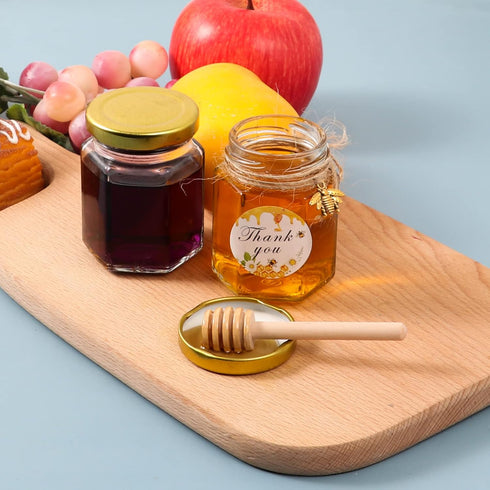 3 oz 30 Pack BIGIVACA Mini Honey Jars - Hexagon Glass Jars with Wood Dippers, Gold Lids, Bee Pendants, Jutes, Stickers