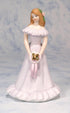 ENESCO Growing Up Girls Brunette Figurine, Age 16, 6.5 Inch, Multicolor, Holding Ribbon