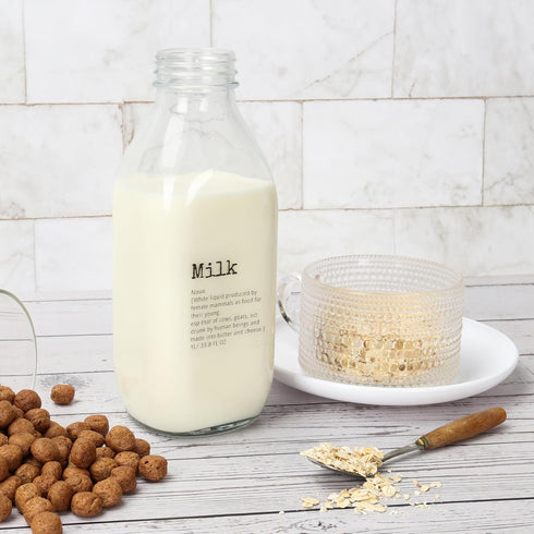 DHSBTLS 4 Pcs Glass Milk Bottles - 33.8 Oz Reusable Containers with Lid for Fridge, Airtight Heavy Duty Juice Jar