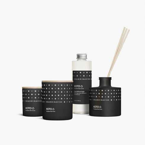 Skandinavisk KOTO Mini Scented Candle 'Home', 2.3 oz. Fragrance Notes: Vanilla Beans, Dried Orange Peel, Amber, Leather.