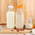 CARBLIN 32 Oz 2 Pack 2 1 Glass Milk Bottles, Scale Mark Drinking Jug with Nut Milk Bags& Airtight Screw Lid & Silicone