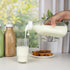 LOSANJI 4 Pack 32 Oz 2 2 1Qt Glass Milk Bottles with Nut Milk Bag & Pour Spout & Airtight Lids & Brush- Scale Mark