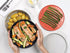 Joseph Joseph M-Cuisine 4-Piece Stackable Cooking Set, 2 Liter Cooking Pot, Steamer, Griddle, and Lid in Orange/Beige