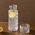 FQDGTFA 4-Piece Set 21.6 Oz 6 Oz Counter, Set Bedside Water Carafe and Glass, Glass Pitcher with Drinking Cup Lid