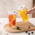 20oz 4 Pack GOSCHE Glass Tumblers with Straws and Lids, Ribbed Iced Coffee Cups Leak-proof, Dishwasher Safe, Thickened