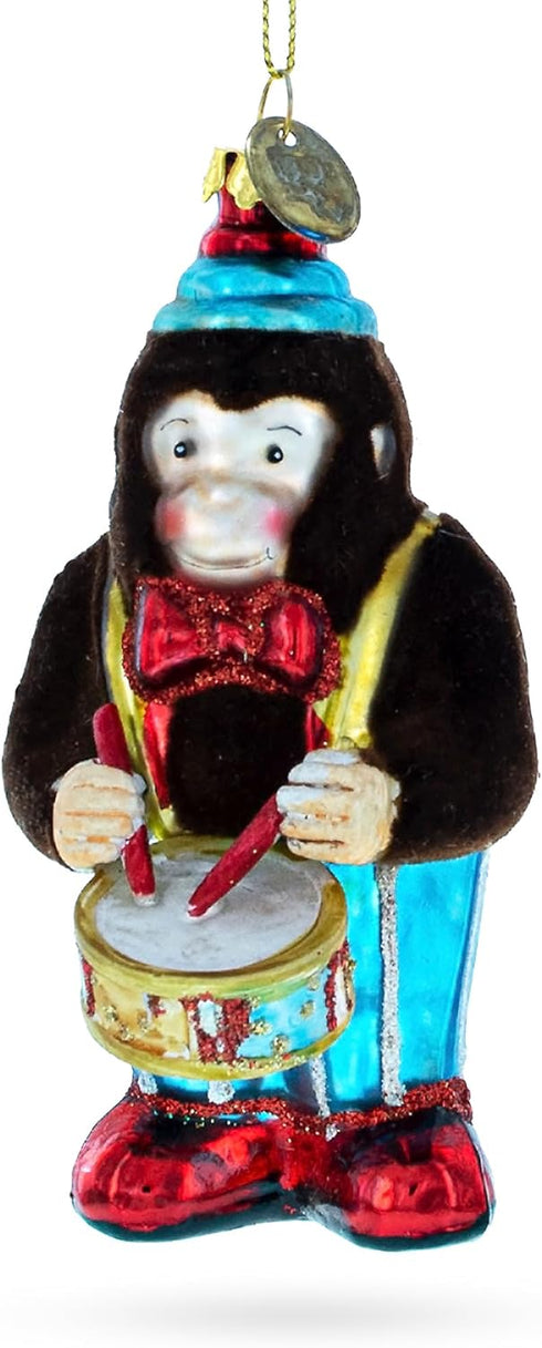 Fluffy Monkey Drumming Blown Glass Christmas Ornament
