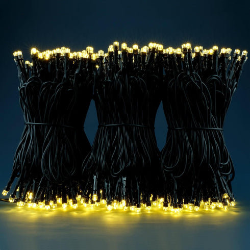 YULETIME 100 ft Warm White LED String Lights with 300 Count, 8 Models Adapter, Black Wire, 5mm Christmas Lights