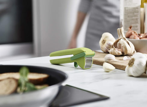 Joseph Joseph Green Garlic Mincer with Trigger Wiper - Easy Clean Design