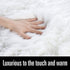 LOCHAS Deluxe Super Soft Fluffy Shaggy Faux Sheepskin Rug for Bedroom, 2ft x 3ft, Ivory White