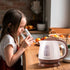 Aigostar Small Electric Kettle, 1L Portable Tea Kettle, 1100W with Automatic Shut-Off, BPA-Free (Brown)