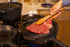 GSI Outdoors Guidecast 10" Dual-Sided Cast Iron Griddle/Grill Pan with Removable Wire Handles