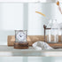 NIKKY HOME Small Quartz Analog Table Clock - Elegant Crystal Design, Non-Alarm, 3.5x1.5x3.5 Inches, White & Pink