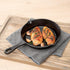 Restaurantware Met Lux 7.75 Inch Cast Iron Skillet - Pre-Seasoned Fry Pan with Handle and Pour Spouts for Cooking