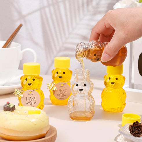50 Pack 2 oz Plastic Honey Bear Bottles Jars, Honey Bear Cup with Lids Mini Bear Shape Empty Honey Bear Bottle Honey