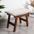 Compact Bamboo Ottoman with Beige Cushion and Brown Legs - Ideal Foot Rest