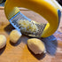 Set Angel's Peel Lounge Stainless Steel Garlic Press Rocker with Silicone Garlic Peeler & Cleaning Brush Garlic