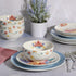 Set, 12-Piece Spice by Tia Mowry Goji Blossom Decorated Porcelain Chip and Scratch Resistant Dinnerware Blue