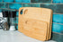 Lipper International Bamboo Wood Thin Cutting Board with Oval Hole, Assorted Sizes, Set of 3