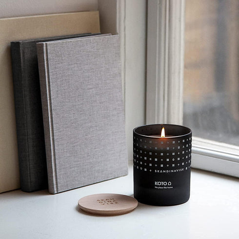 Skandinavisk KOTO Mini Scented Candle 'Home', 2.3 oz. Fragrance Notes: Vanilla Beans, Dried Orange Peel, Amber, Leather.