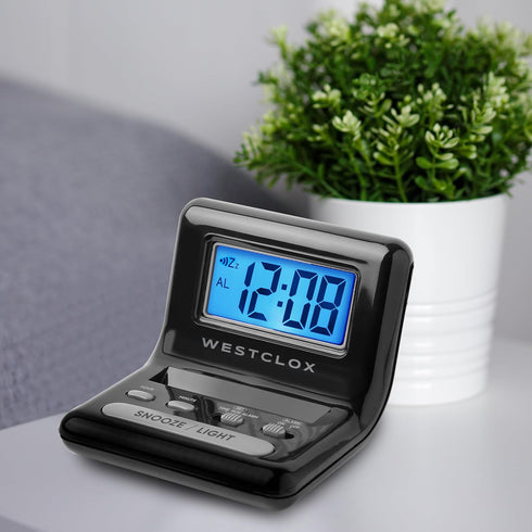 Westclox LCD Digital Bedside Alarm Clock, Black, 3-Inch, Battery Operated with Blue Backlit Display and Snooze Function