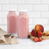 16oz Pack 4 kitchentoolz Square Glass Milk Bottles with Airtight Plastic Lids of | Reusable Milk Containers for Fridge