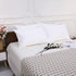 NTBAY 4 Pack Zippered Waterproof Pillow Protectors, Super Soft Quiet Zip Pillow Cases 20x26 Inches Jersey Pure White