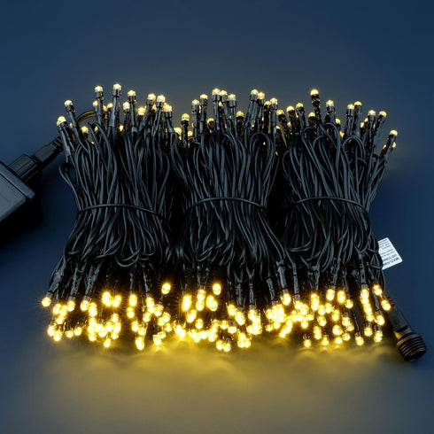 YULETIME 100 ft Warm White LED String Lights with 300 Count, 8 Models Adapter, Black Wire, 5mm Christmas Lights
