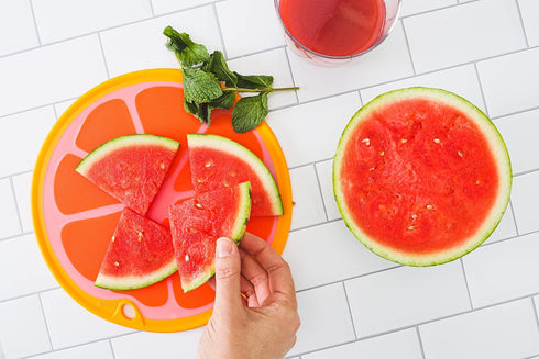 Dexas Citrus Slice Cutting Board/Serving Board, 9 inches, Grapefruit