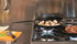 Lodge Pre-Seasoned Carbon Steel Skillet, 12 Inch, Use on Oven, Stove, Grill, or Campfire