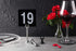 New Star Foodservice 23084 Double Side Plastic Table Numbers, 4" x 4", Light Grey on Black