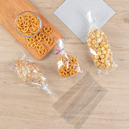 Restaurantware 100 Clear Plastic Gusset Bags 4 x 2.3 x 8 Inch - Heat Sealable Food Safe Treat Bags for Popcorn or