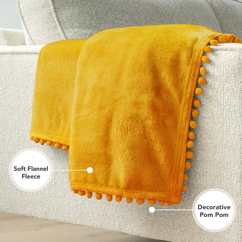 Cozy 50x60 Inches PAVILIA Fleece Throw Blanket for Couch with Pom Pom Fringe, Mustard Yellow, Soft Fuzzy Flannel